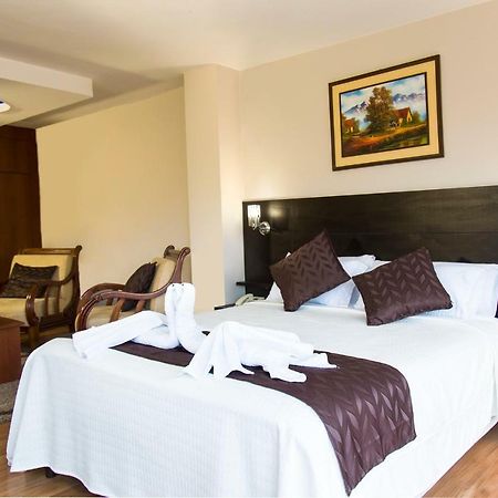 Hotel Versailles Ambato Bagian luar foto