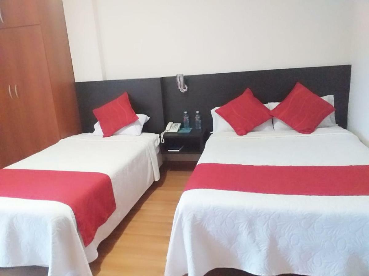 Hotel Versailles Ambato Bagian luar foto